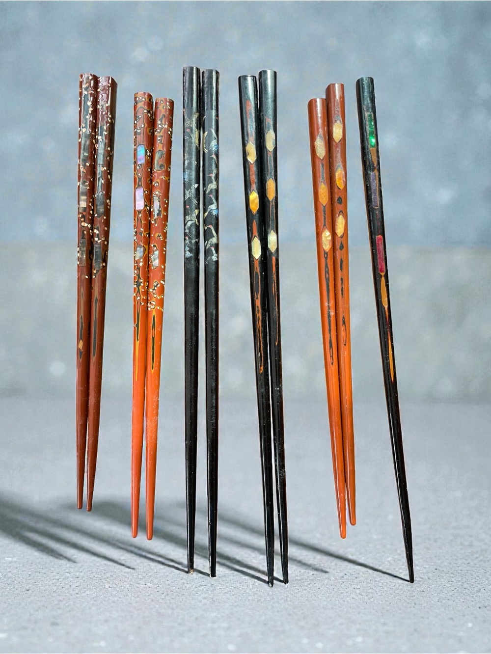 5 sets of vintage/antique chopsticks, lacquered, mother of pearl insets